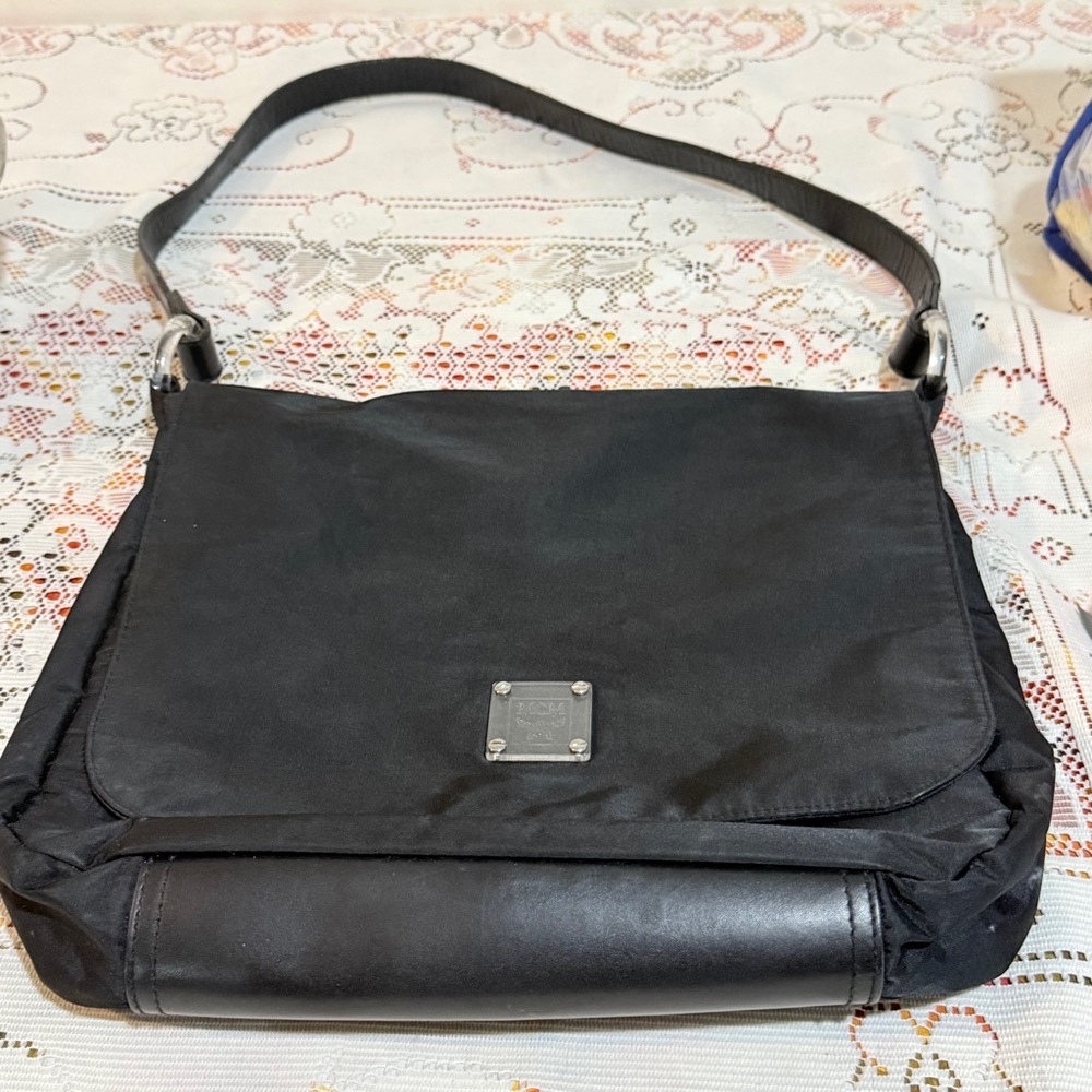 MCM Black Messenger Bag Sleek Leather Design